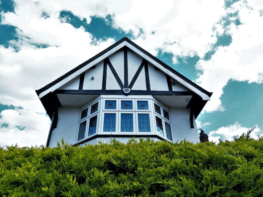 Real Estate as an Inflation Hedge: Property vs. REITs in 2026